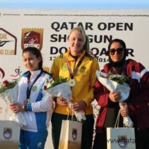 Young Victorian shooter Penny Smith on the podium after winning gold at the Qatar Open.